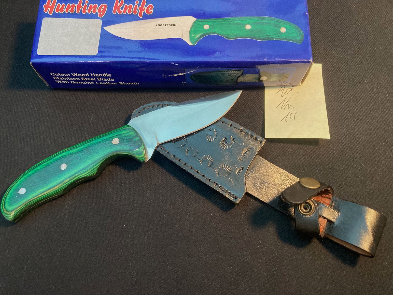 Jachtmes, riemmes, lemmet ca. 8cm, totaal 21cm, leren schede zwart, nieuw + OVP