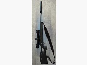 Sauer 404 Synchro XT (Sistema de acero) con mira telescópica y silenciador