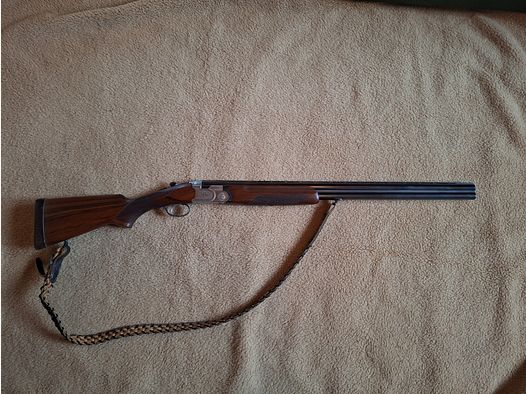 Escopeta de doble cañón superpuesta de Beretta, modelo B25, calibre 12/70