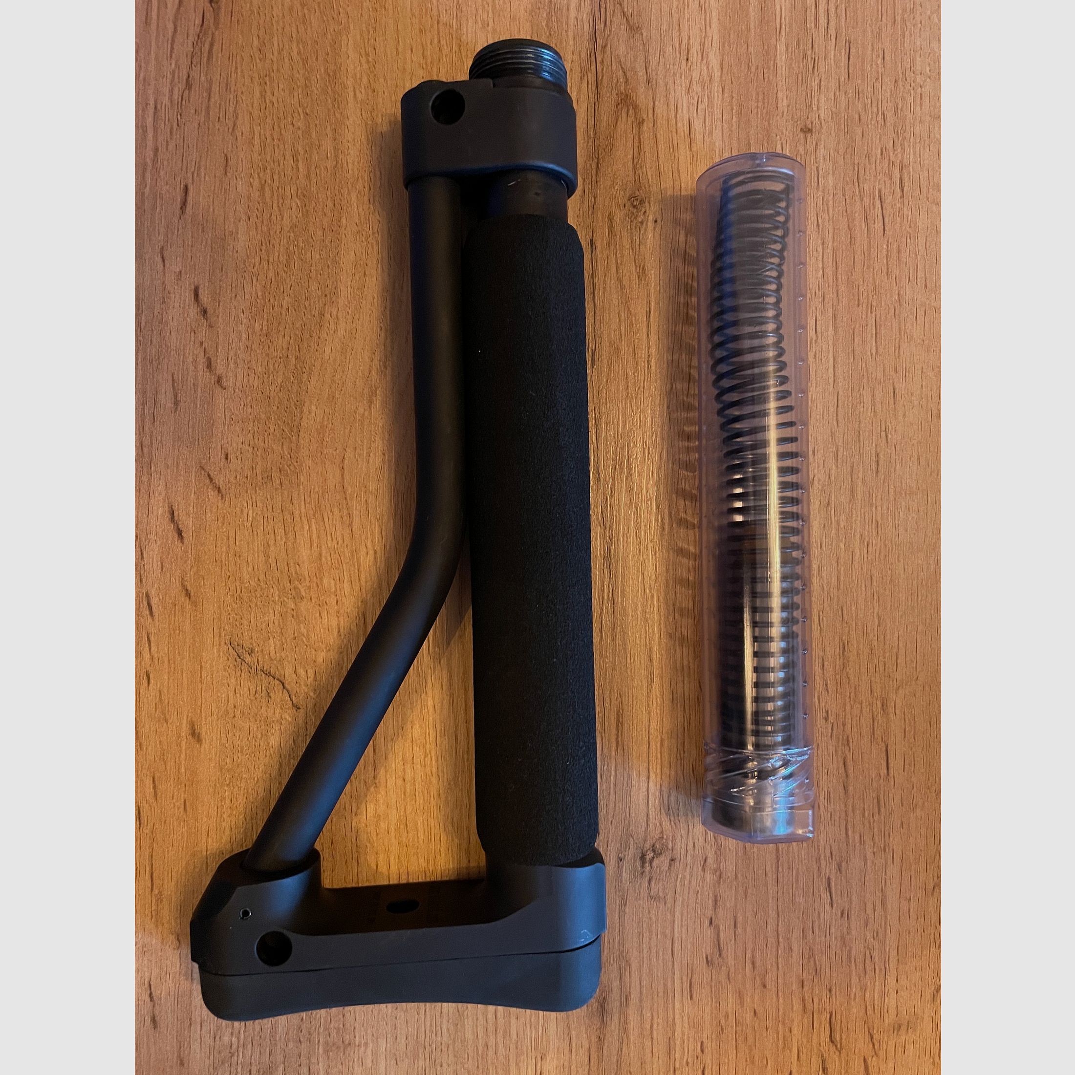 ACE crosse pour systèmes AR incluant tube et ressort