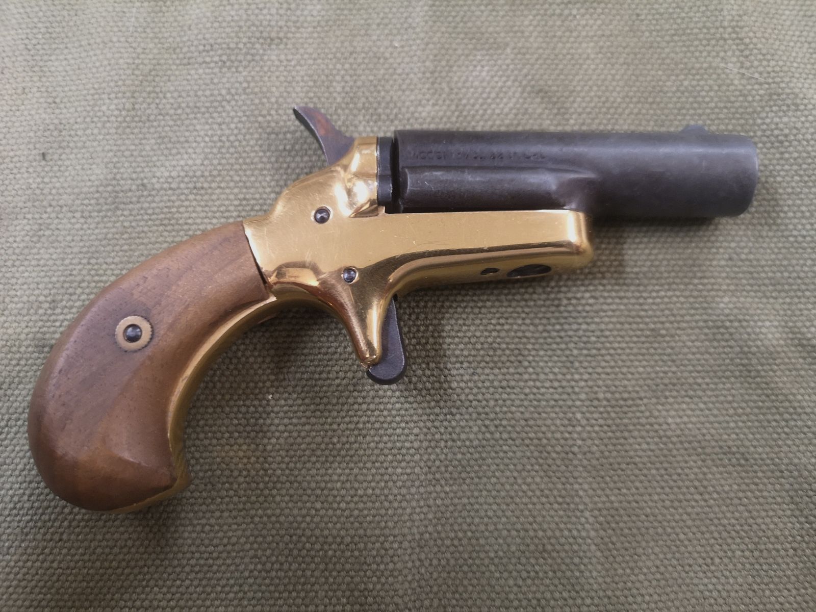 Derringer Eusta 1873  Kaliber: .22lr/.22lfb