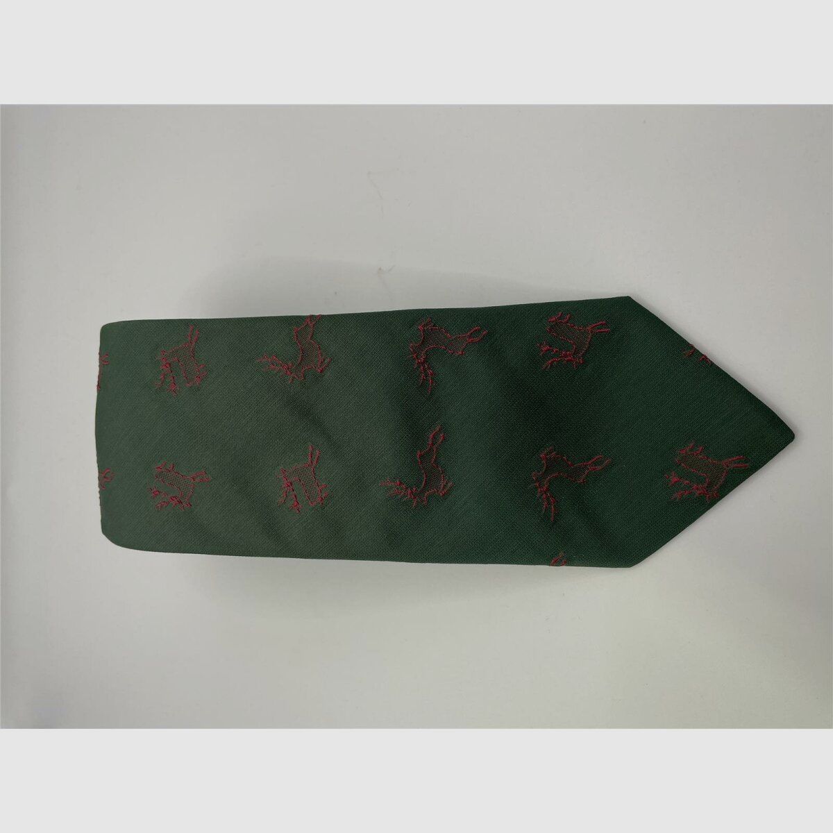 Tie green motif red deer