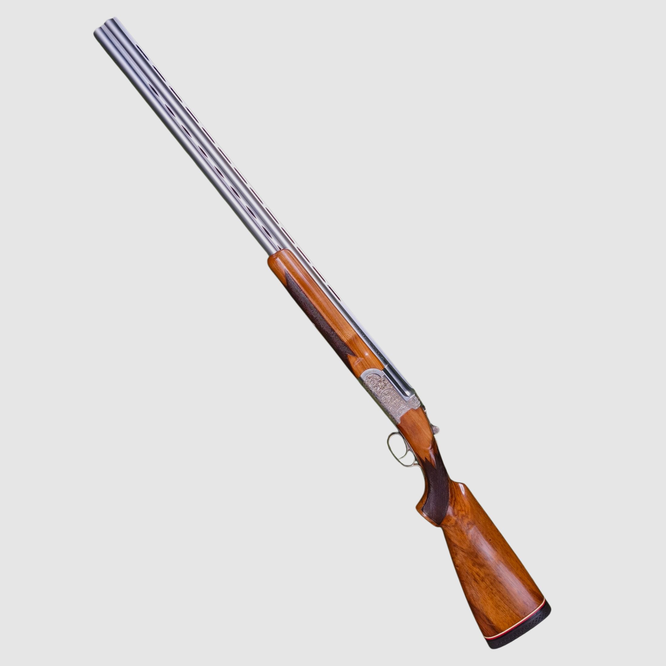 Antonio Zoli over-and-under shotgun 12/70 – Trap 76 cm – engraved – Nickel Chrome Steel – Year of manufacture 1975