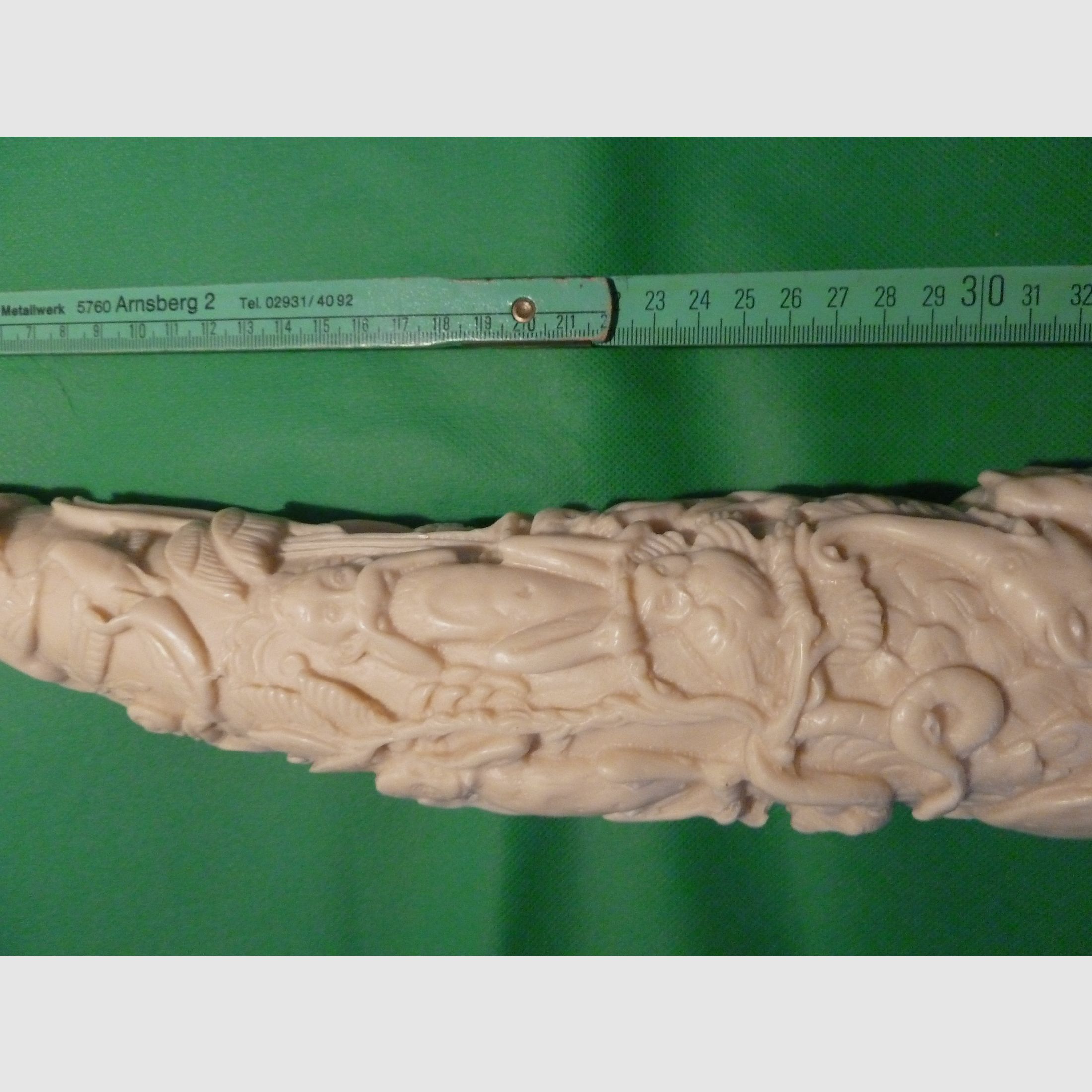 Carved elephant tusk made of resin