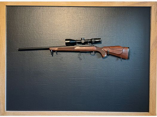 Tikka M658 Kal. 338 WinMag mit höhenverstellbarem Schaftrücken & M14x1 Gewinde & Steiner 3-12x56