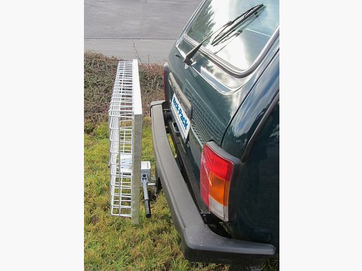 Dispositivo de plegado y desplegado Heck-Pack