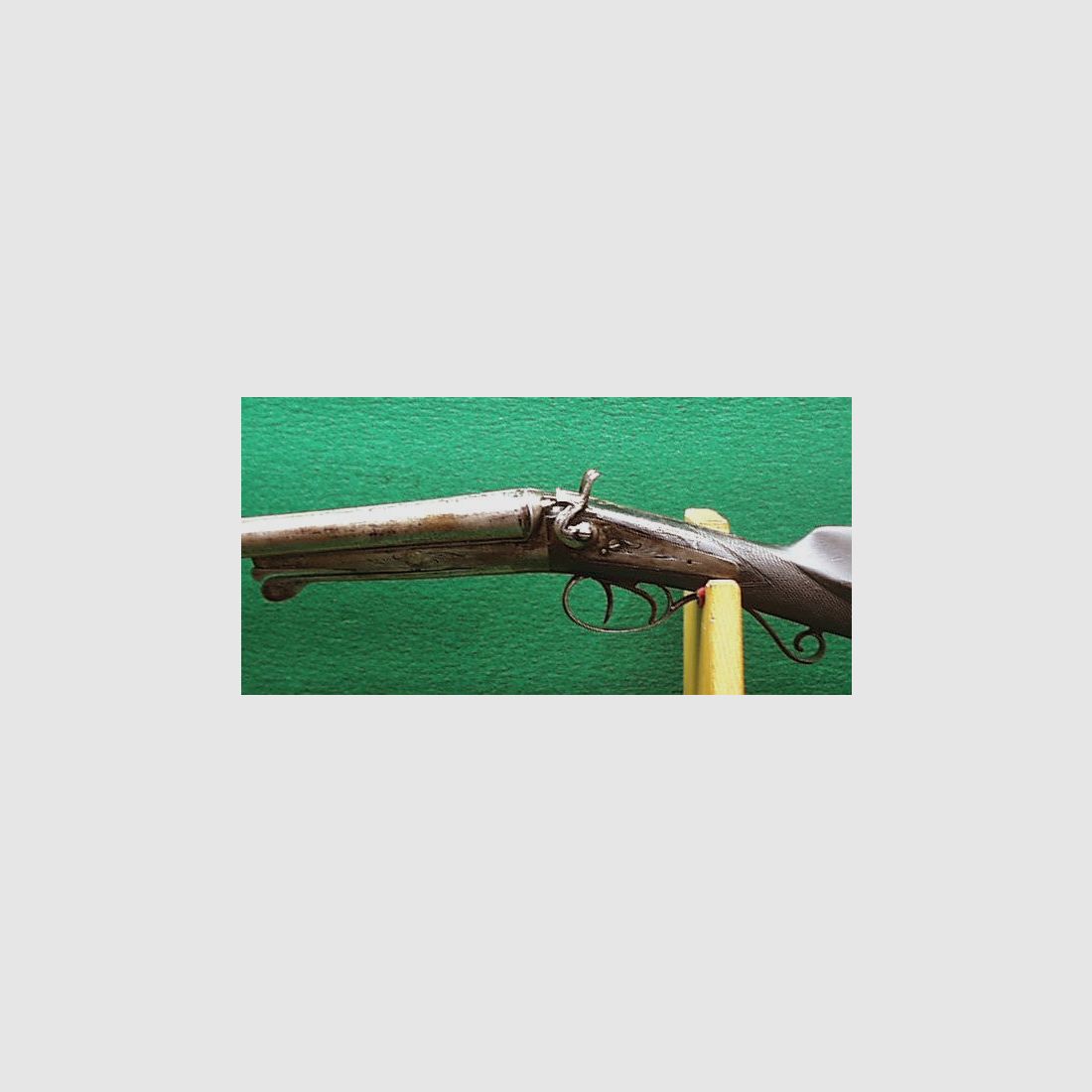 Double-barrel shotgun with spoon lock