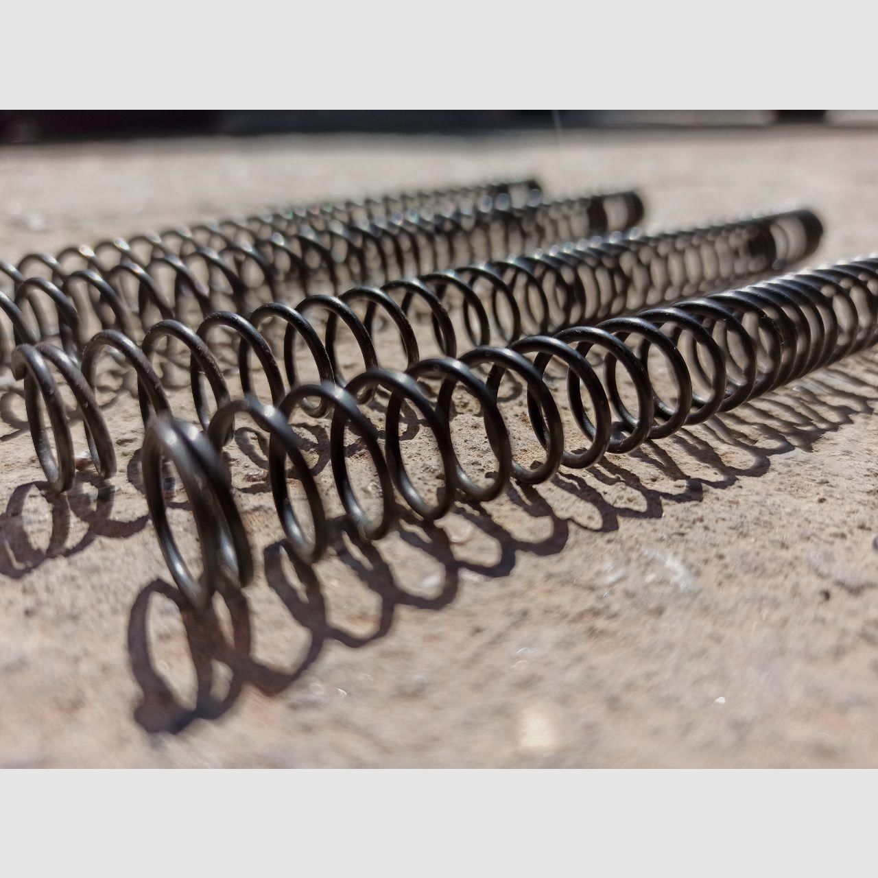 M110 spring, nonlinear, galvanically galvanized + blue passivated (J-TAC)