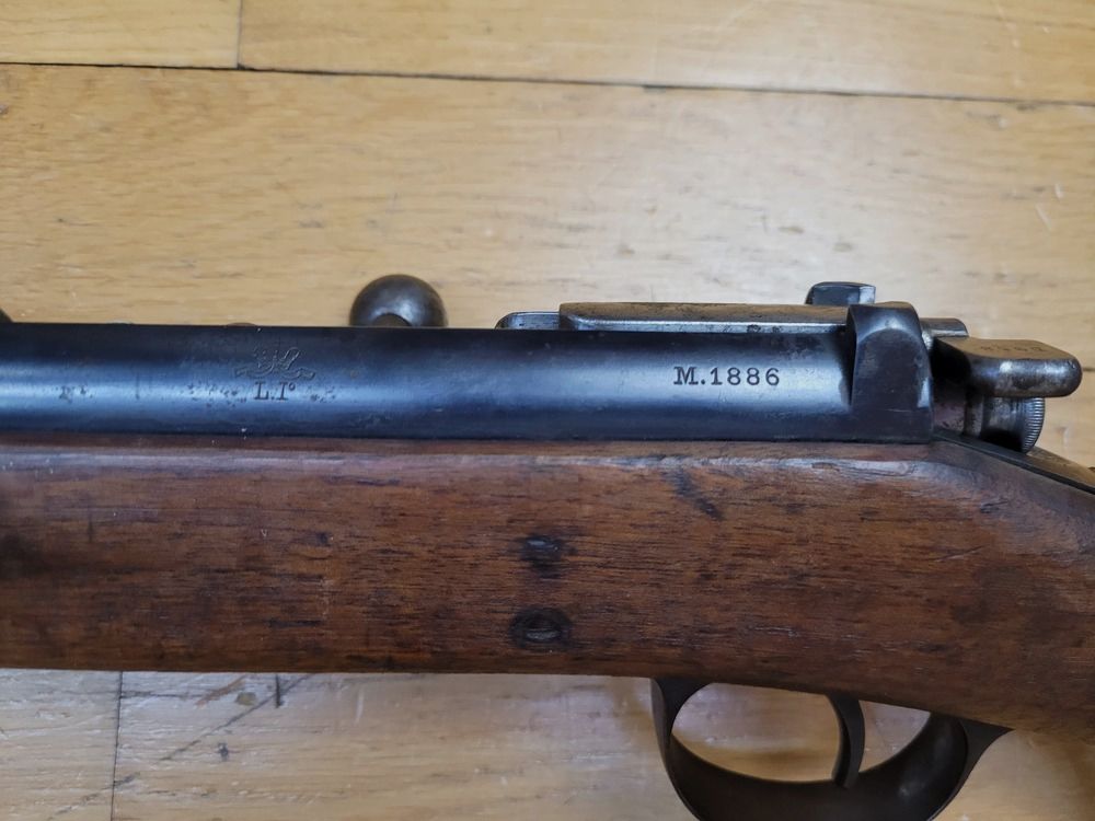 Bardzo dobry karabin Kropatschek model 1886 – Produkcja OEWG w Steyr w 1886 roku (również!) – Oryginalny kaliber czarnoprochowy 8×60 – 8×56 portugalski – Piękne drewno – Dobry stan estetyczny i mechaniczny – Bardzo dobry egzemplarz w BE+ / TBE!, zdjęcie 26 z 31