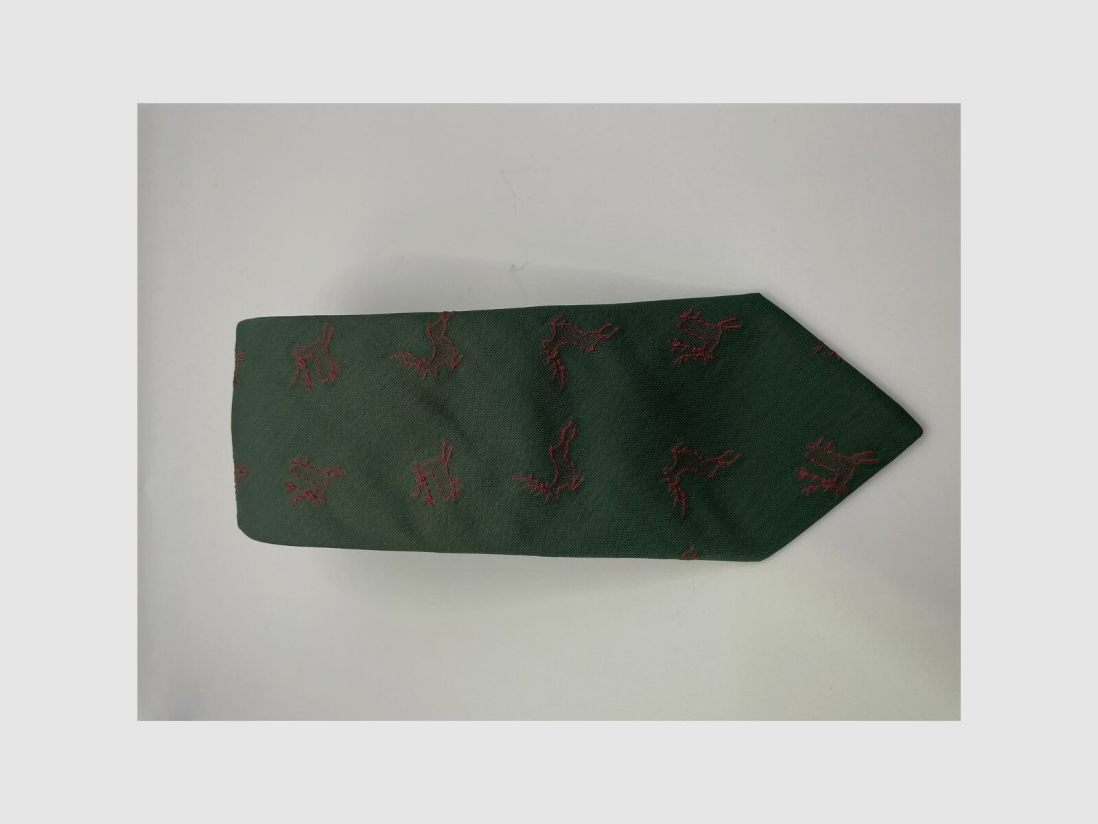 Tie green motif red deer