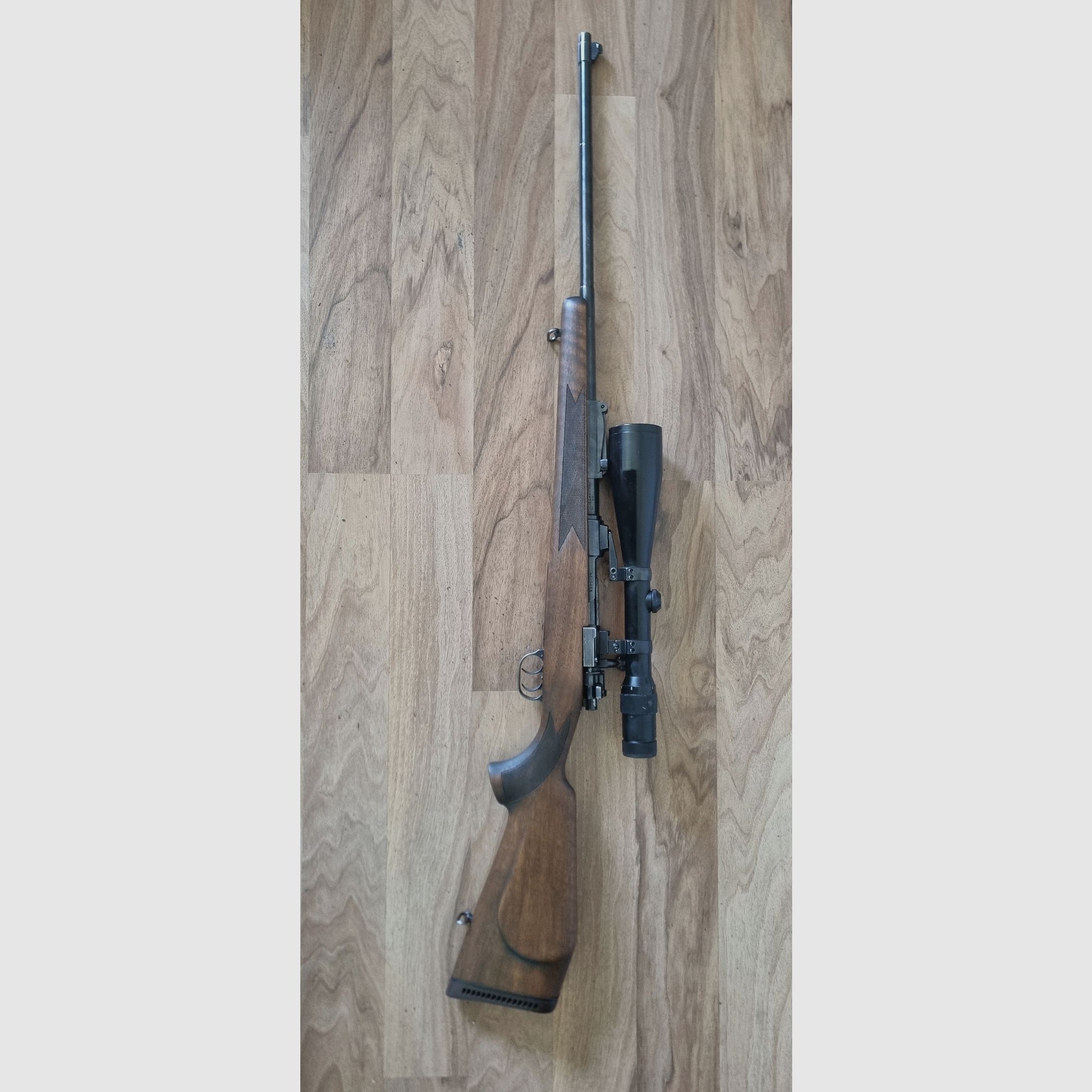 Voere Kufstein Mod. 98 met Docter Optiek VZF 3-12 x 56 M