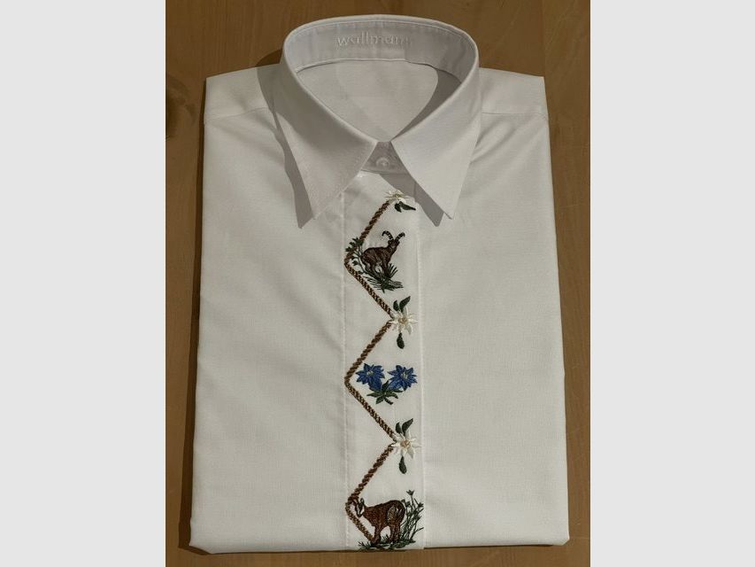 Blusa Wallmann "Steinbock-Gemse-Edelweiss-Enzian" in bianco