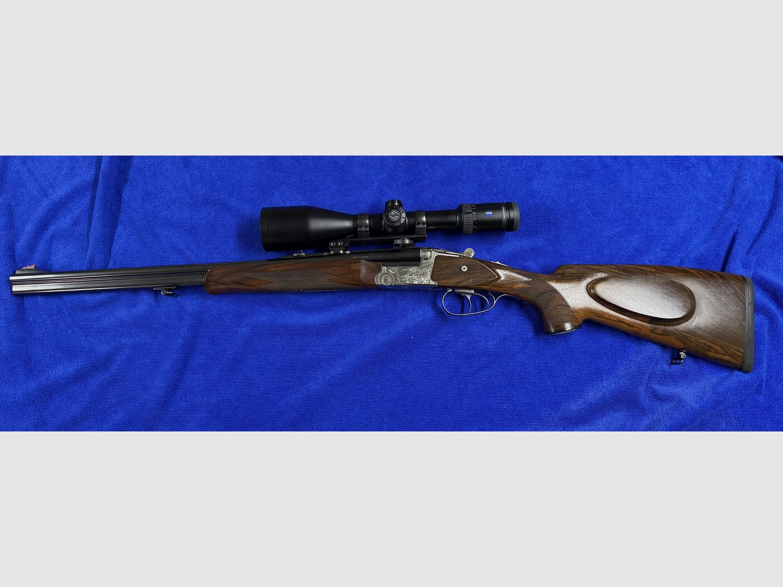 Merkel Doppelbüchsdrilling DR 961L avec lunette ZEISS Victory HT 3-12x56