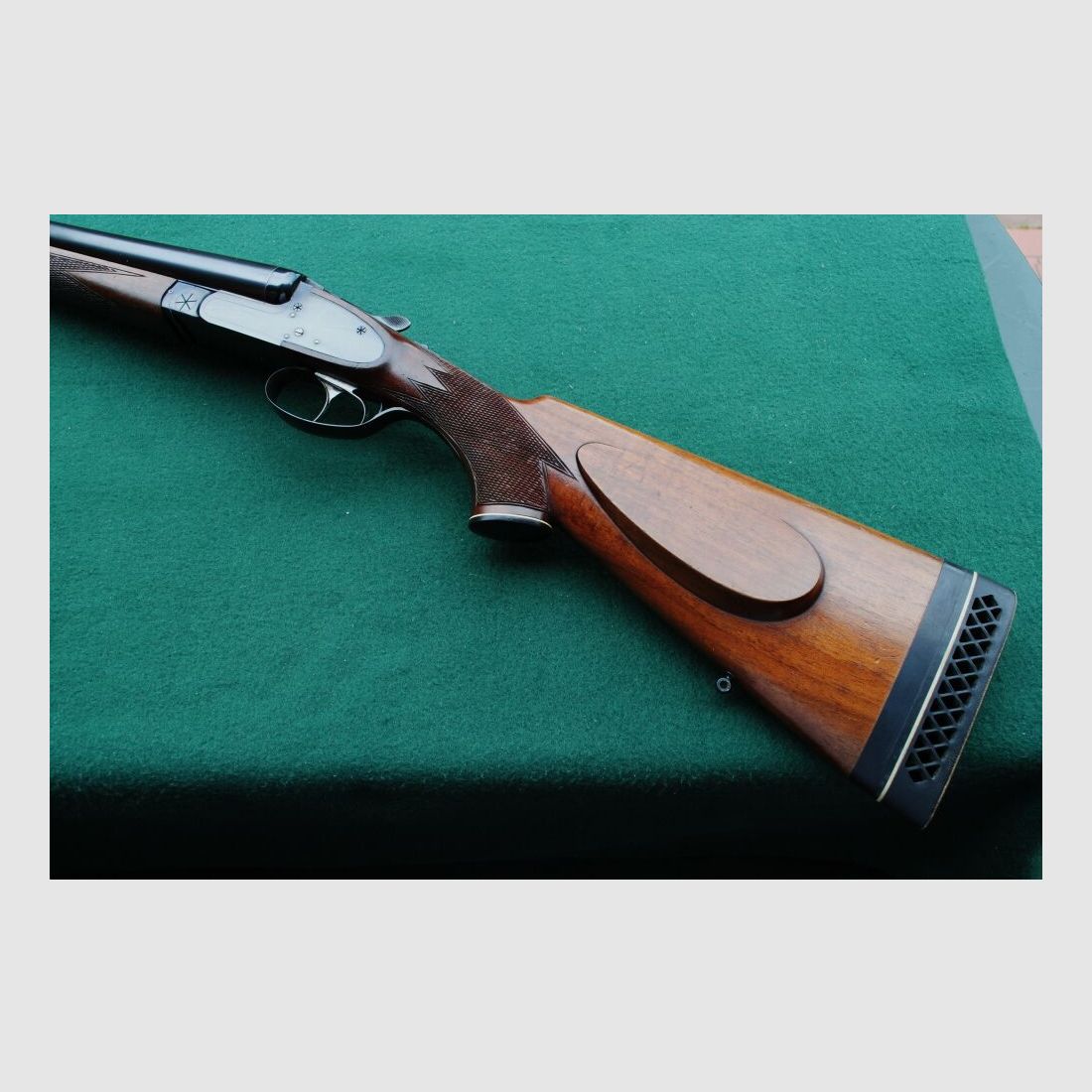 CAS escopeta de caza, auténticos cerrojos laterales, sin extractores, seguro manual.