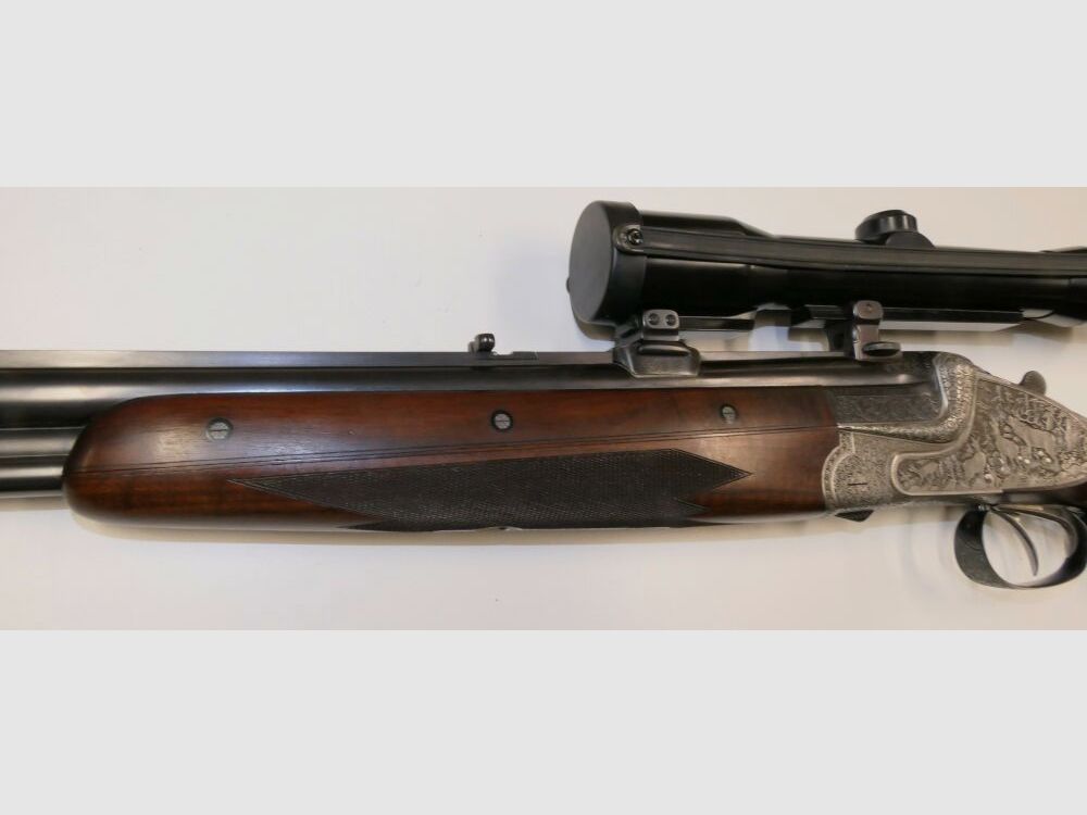 Merkel E313 mit jagdlichen Tiergravuren