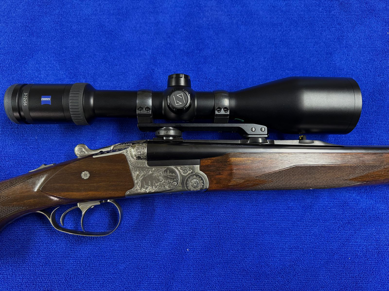 Merkel Doppelbüchsdrilling DR 961L mit Zielfernrohr ZEISS Victory HT 3-12x56