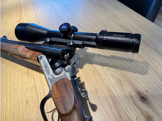 Blaser D99 Doppelbüchsdrilling 9,3x74 / 9,3x74 / 20/76 met 2 x ZF Zeiss voor Ansitz en Drückjagd, BESTZUSTAND