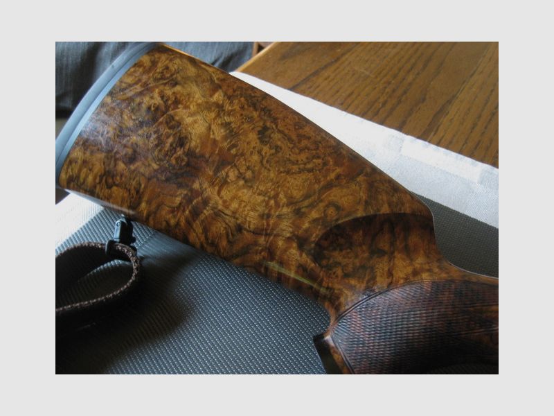 Absolutely UNIQUE COLLECTOR'S ITEM = Almost like new "Custom STEEL SYSTEM completion" with HAND-MODELED FULL ENGRAVINGS for R93, with custom-made right-handed semiweight stock and Category-11!! System is still one WITHOUT serial number!! Includes Blaser leather rifle sling!, image 6 of 17