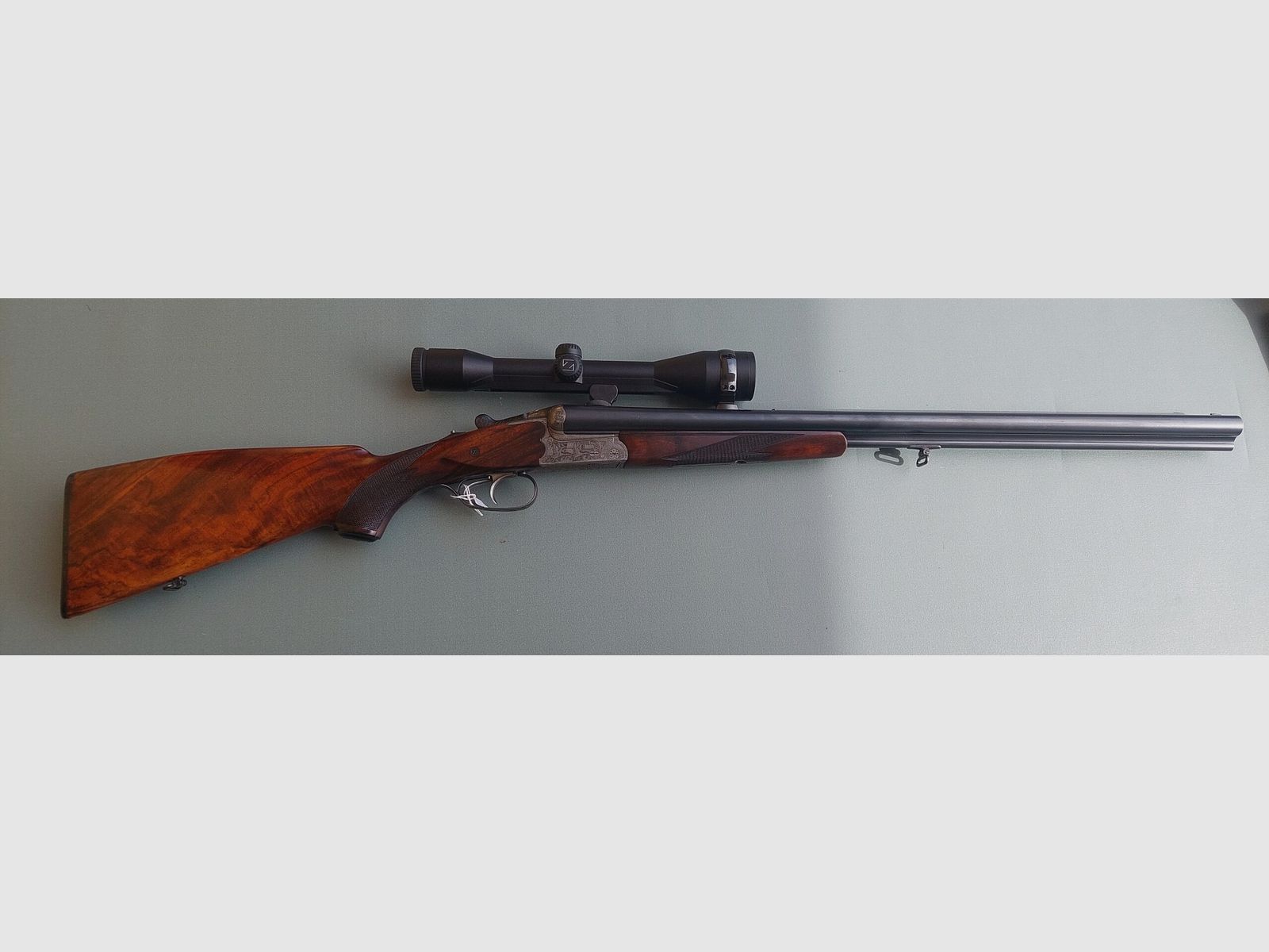 B 5 DRILLING SIMONS MOD. LUSSO KAL. 12-12-7X65R MIT SCHWEINEFUSS-MONTAGE UND ZEISS 6X42 OPTIK, Bild 1 von 8