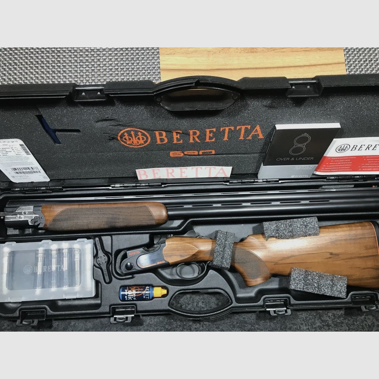 Beretta 690 Sporting Black cal. 12, 76 cm, as good as new with case & accessories!