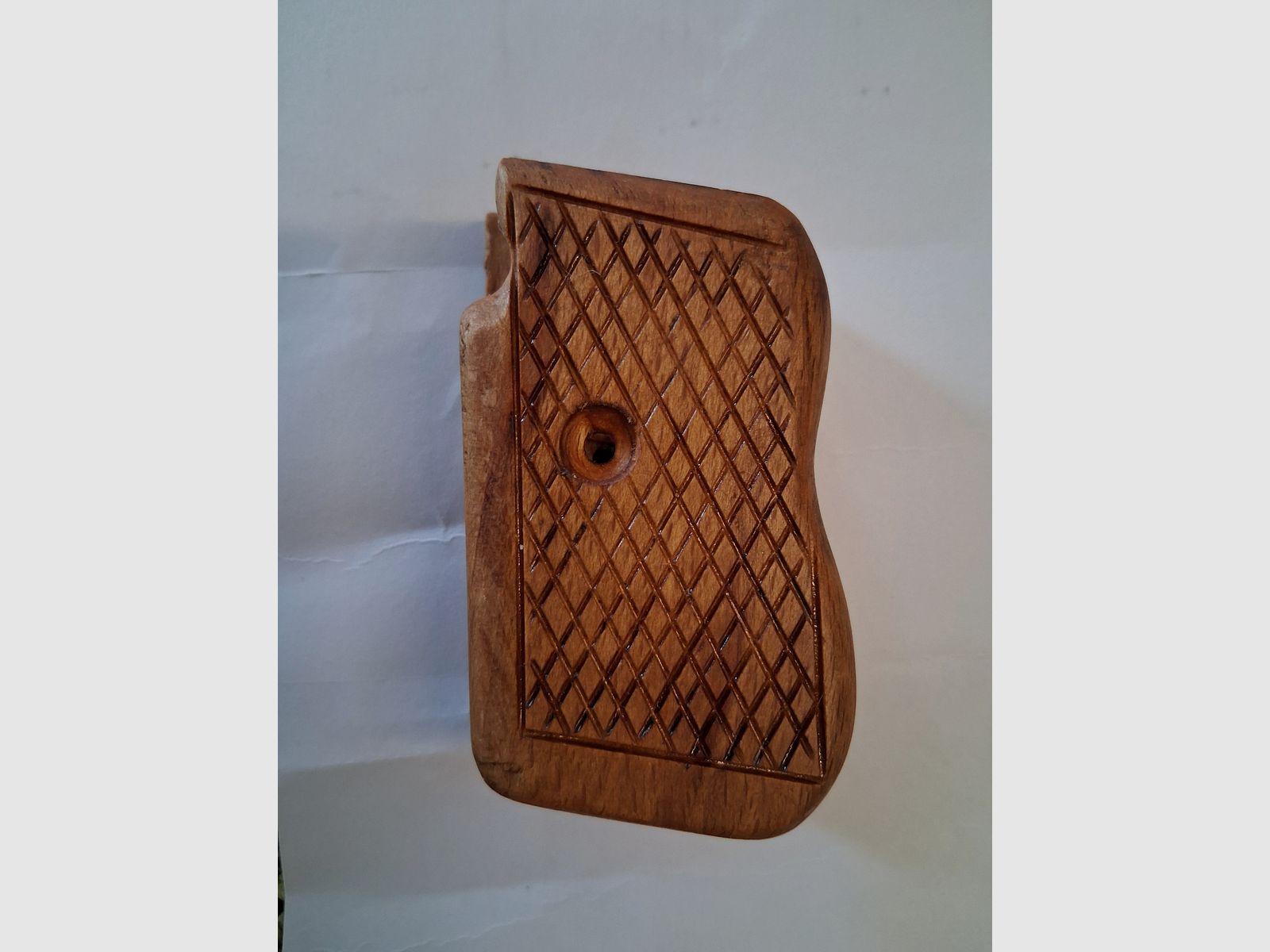 Wooden grip panel for old Mauser pistol