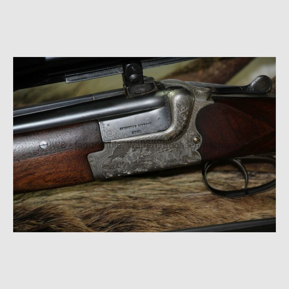 Merkel double-barreled shotgun with interchangeable double-barrel and variable sight 12/70; 7x57R