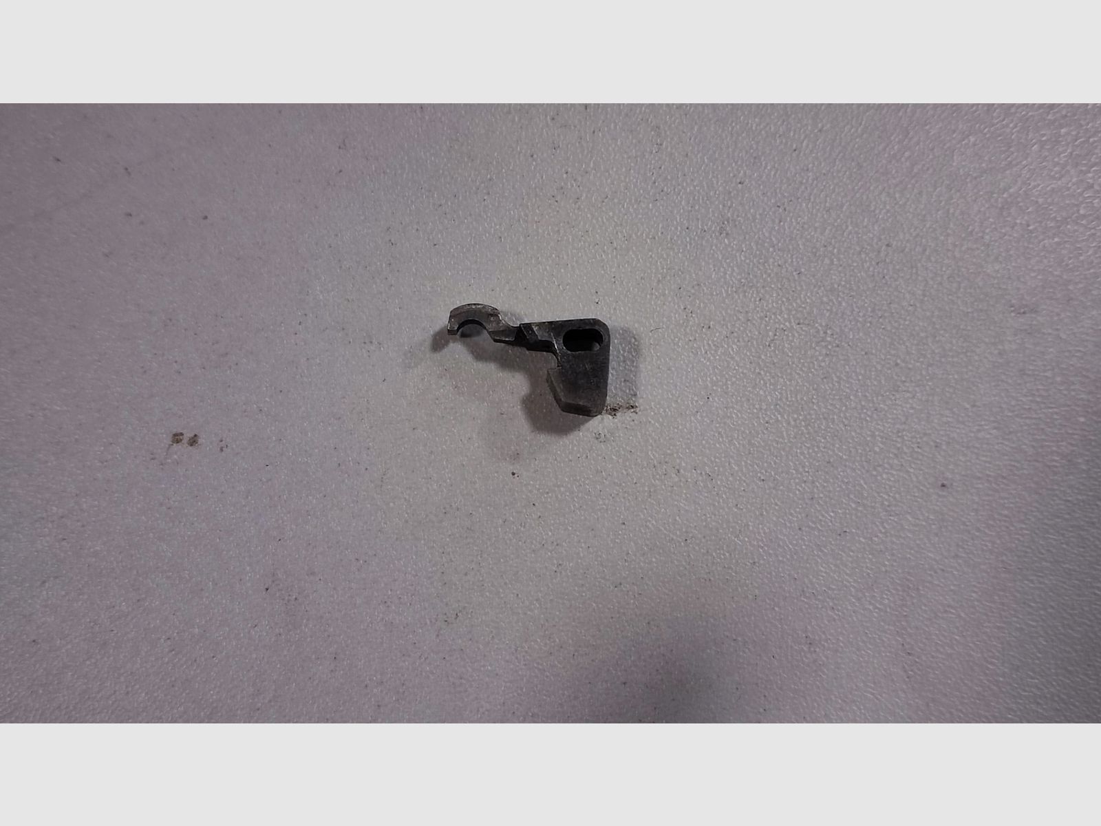 Zatrzask bębna Smith i Wesson K22, zdjęcie 1 z 2