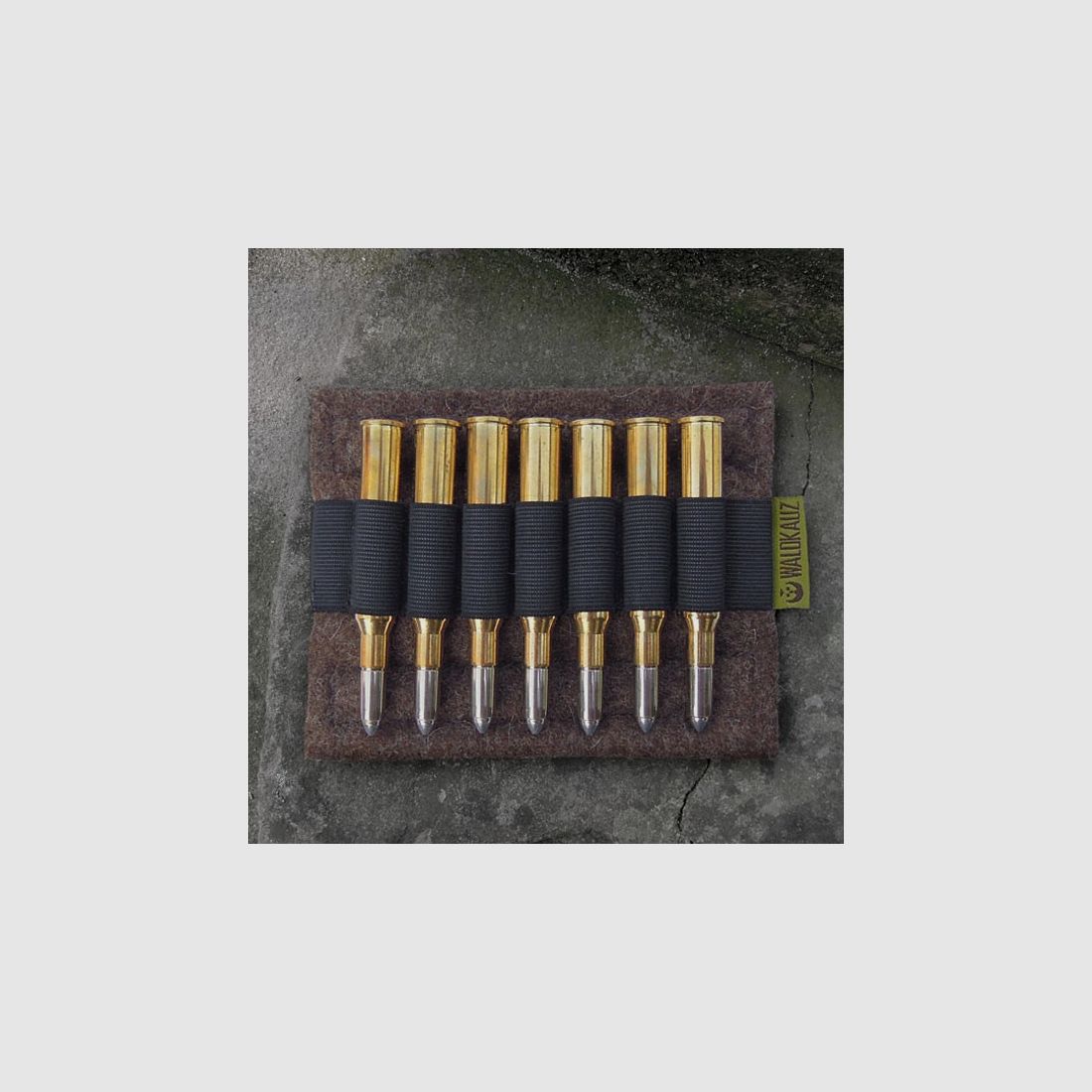 Forest owl rifle cartridge case element
