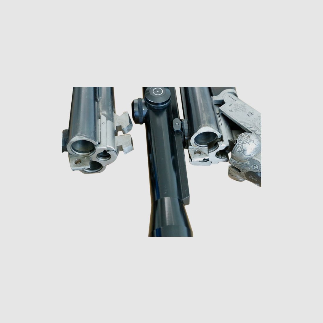 Suhler double rifle drilling cal. 2x8x60R and 12/70 with interchangeable barrel cal. 2x12/70, 8x60R and ZF, additional