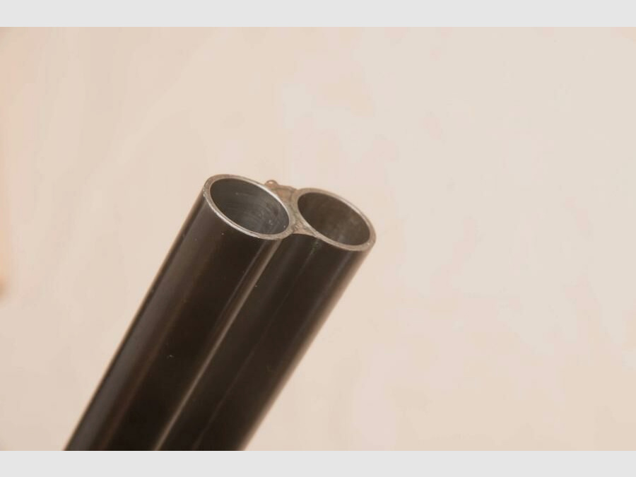 Cross flute double-barrel shotgun