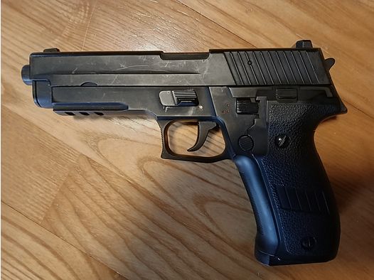 Sig Sauer AEP + valigetta per armi