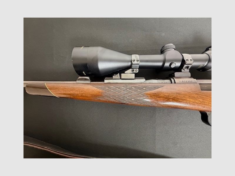 Mauser 66 rifle de caza, rifle de repetición de cerrojo de acción recta, rifle de caza calibre 30-06 en muy buen estado, incl. Tasco Titan 4-12x56 con punto de luz.
