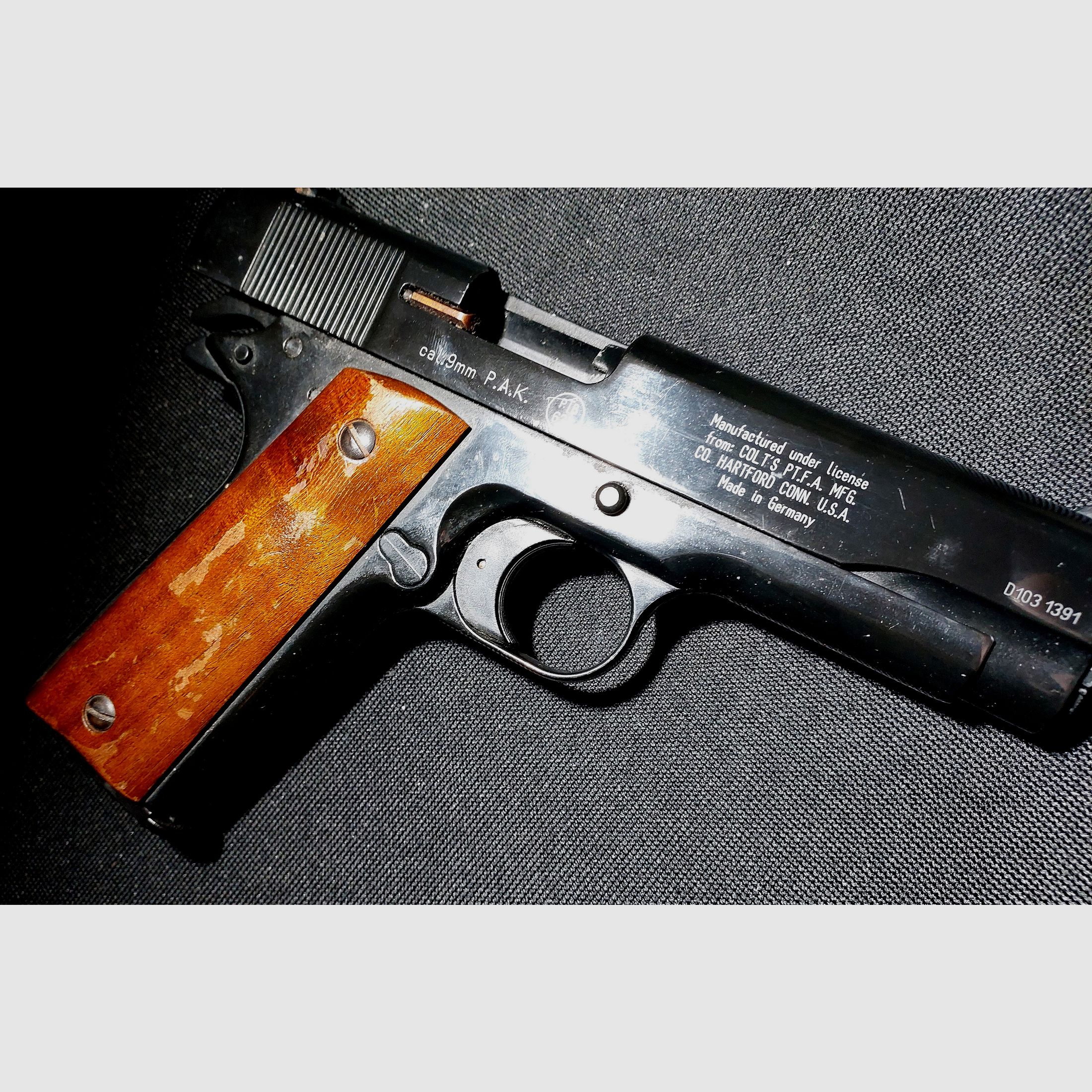 Colt Government 1911 A1 Schreckschuss Pistole 9mm P.A.K. (PTB 774) "vintage Holzgriffe