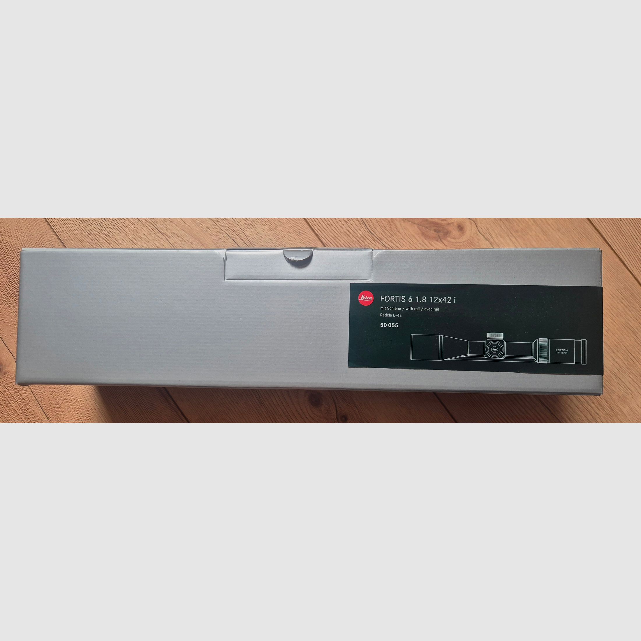 Leica Fortis 1.8-12x42i with rail like new