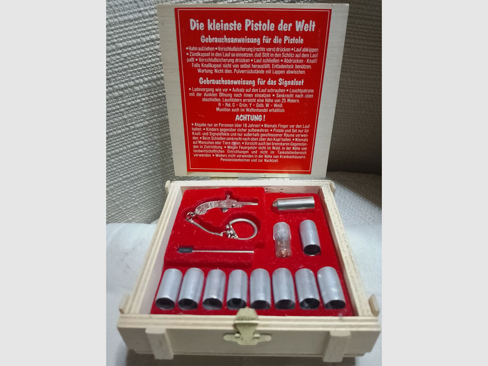 Bellissima scatola da collezione cassa di legno pistola più piccola del mondo set pistola segnale piccola grande esplosione Berloque come nuova