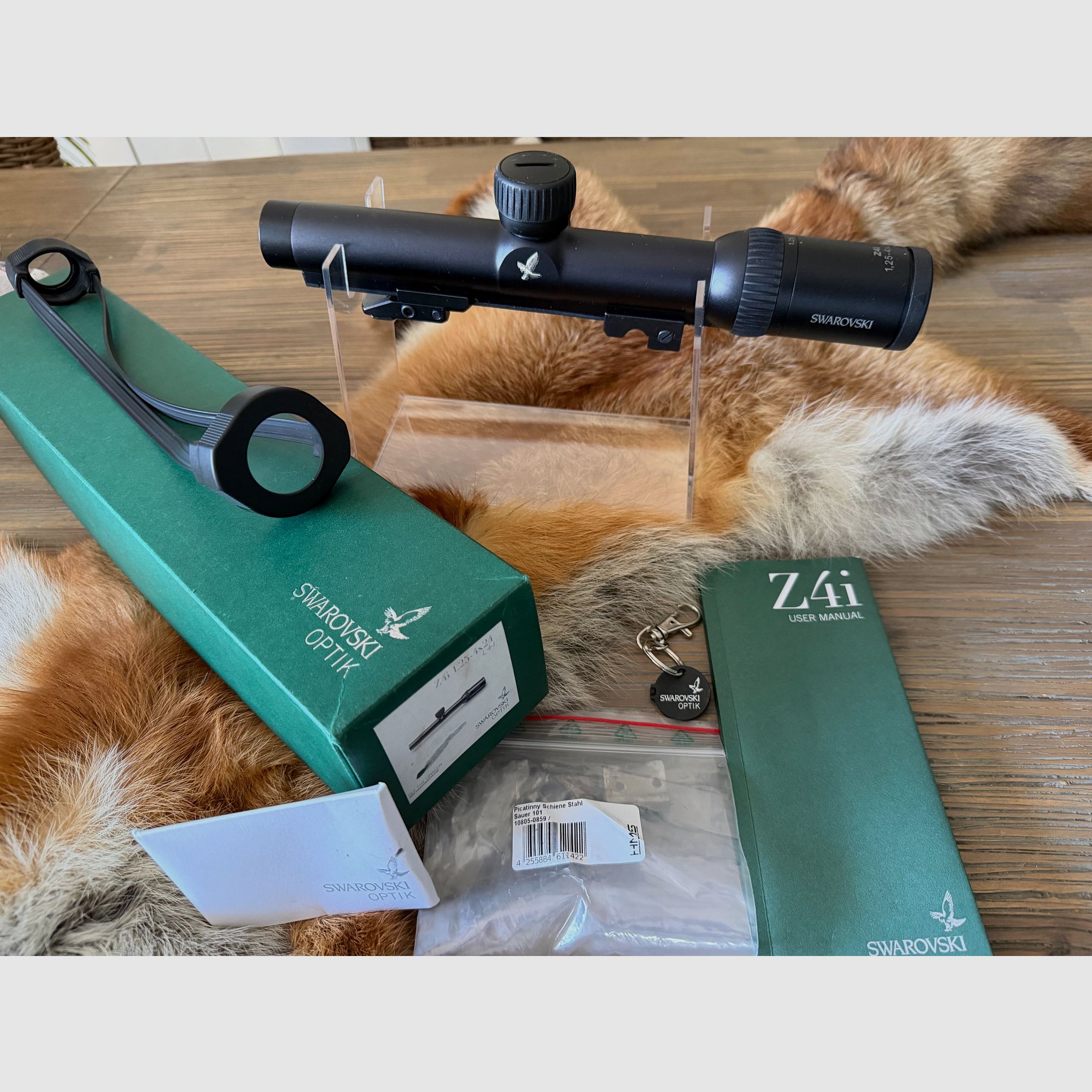 Swarovski Z4i 1.25-4x24 z szyną i montażem obrotowym EAW, zdjęcie 1 z 9