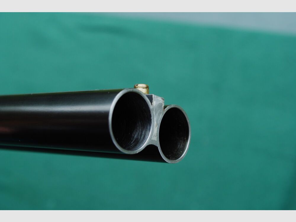 CAS escopeta de caza, auténticos cerrojos laterales, sin extractores, seguro manual.