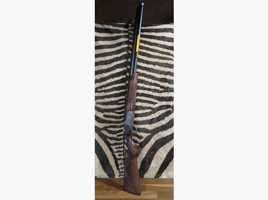Fusil BROWNING 825 Sporter grade 4 cal.12/76 canons 76 cm 5 chokes externes – mallette