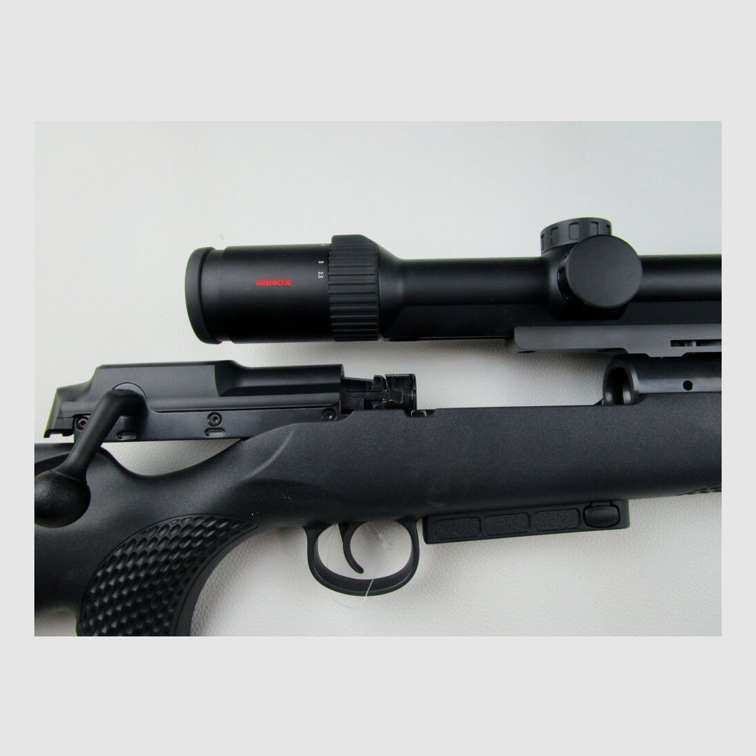 Mauser 25 Extreme with scope and silencer