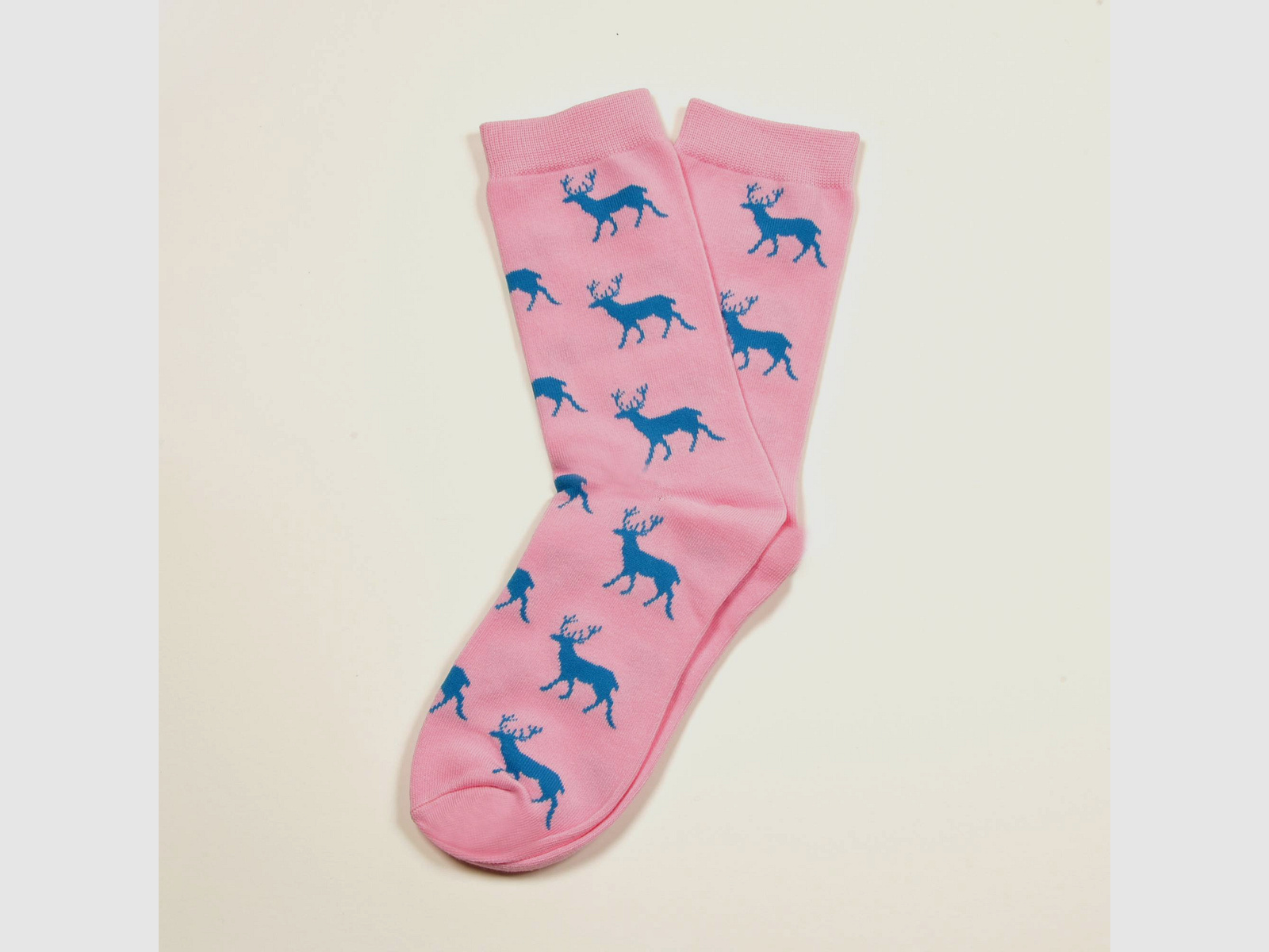 Rosa Socken, Hirsch in Blau