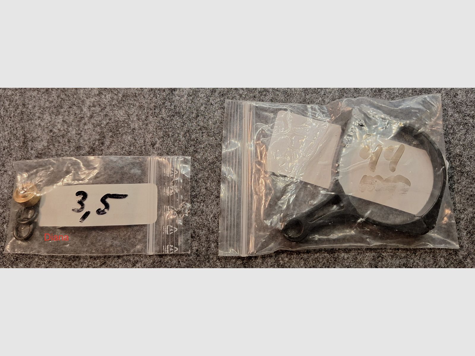 diverse Waffenteile und Zubehör