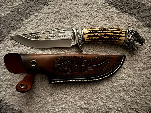 Jachtmes met dikke echt leren schede ongebruikt