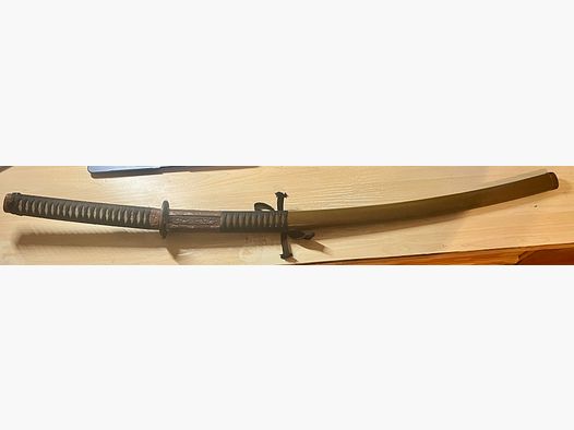 Authentic Japanese officer's katana (Shin-guntō Type 98) from World War II with signed Kanemune blade.