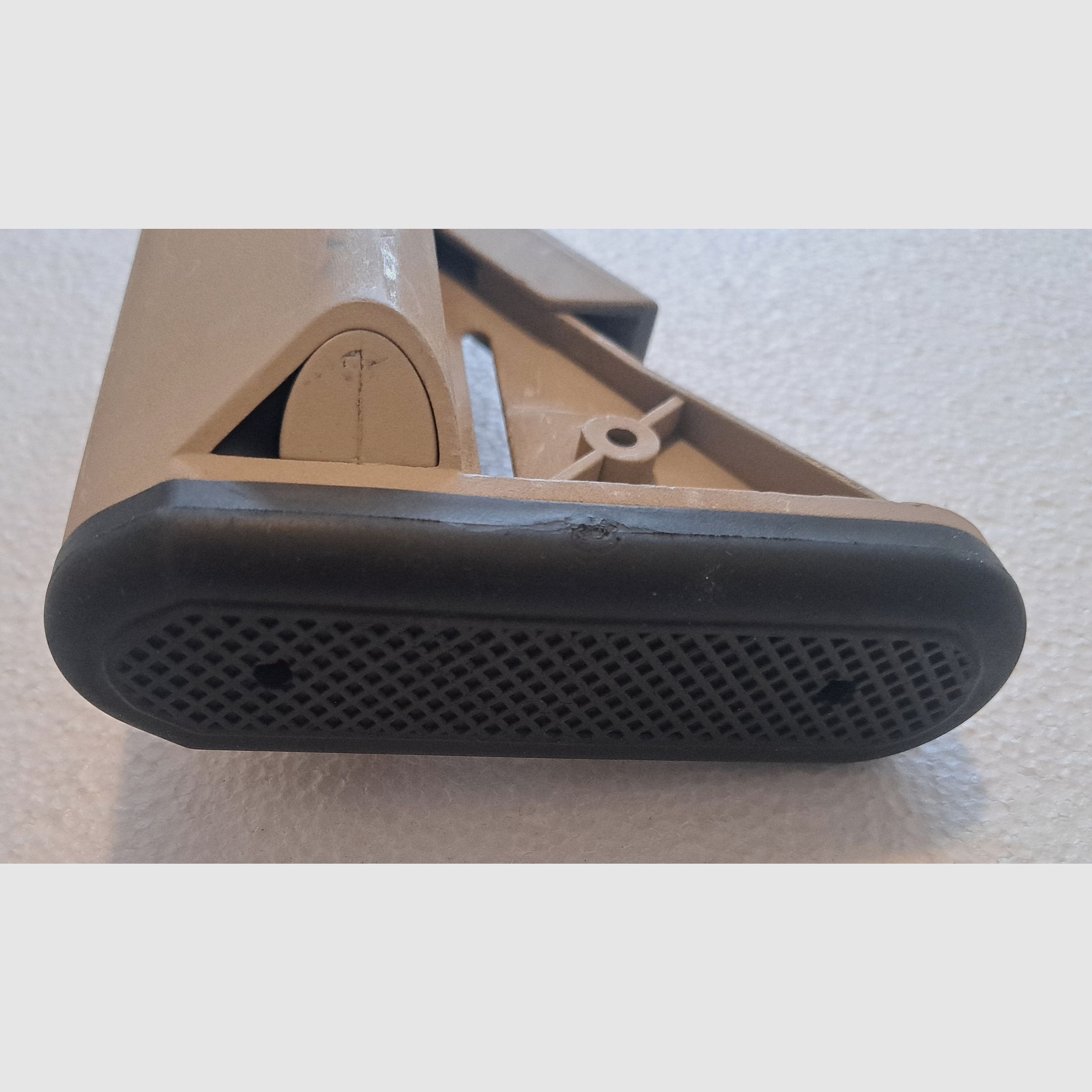 AR-15 / M4 Carbine folding stock with storage compartment sand