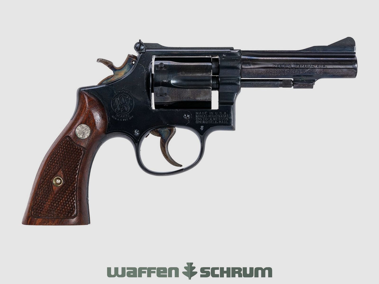 Smith & Wesson Mod. 15-2 .38Special, adjustable sight, wooden grips, blued, barrel length: 4 inches
