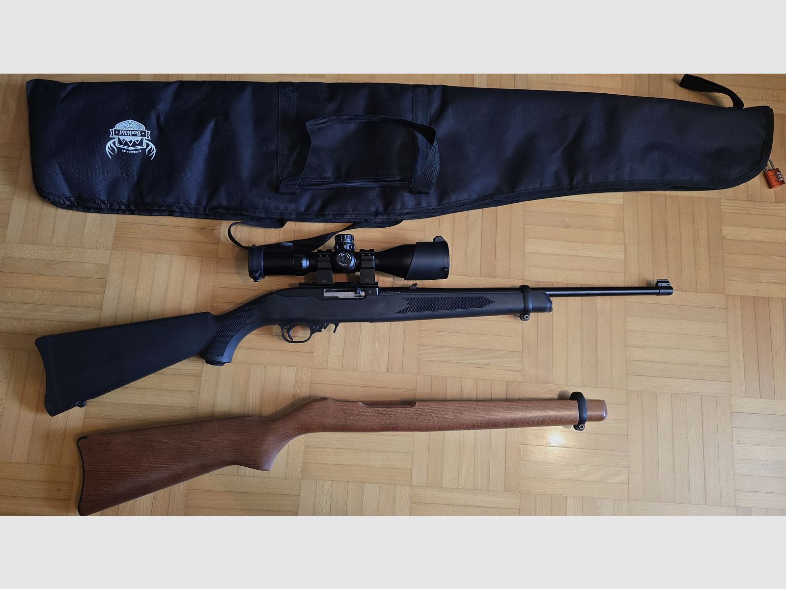 Ruger 10/22 Compact .22lr small caliber long gun. Wooden stock and synthetic stock (interchangeable system) with plenty of accessories