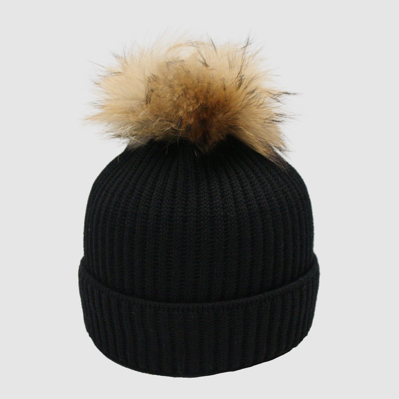 Cappello in maglia Merino con pompon in pelliccia vera e motivo a coste