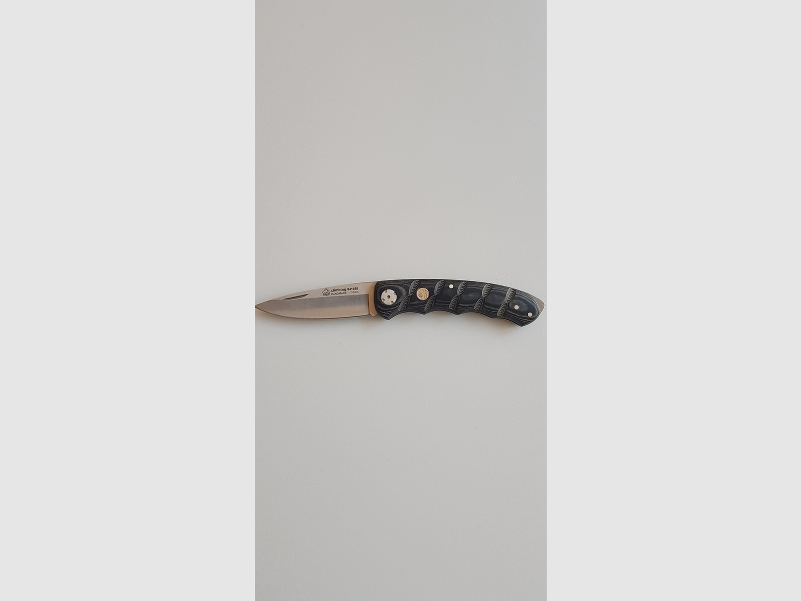 Puma IP climbing micarta