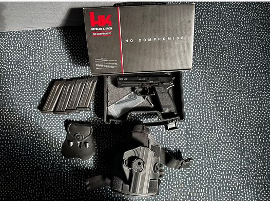 H&K USP GBB incl. 4 Magazinen, Holster, Koffer, Halbe Packung BB's und Airsoftgas