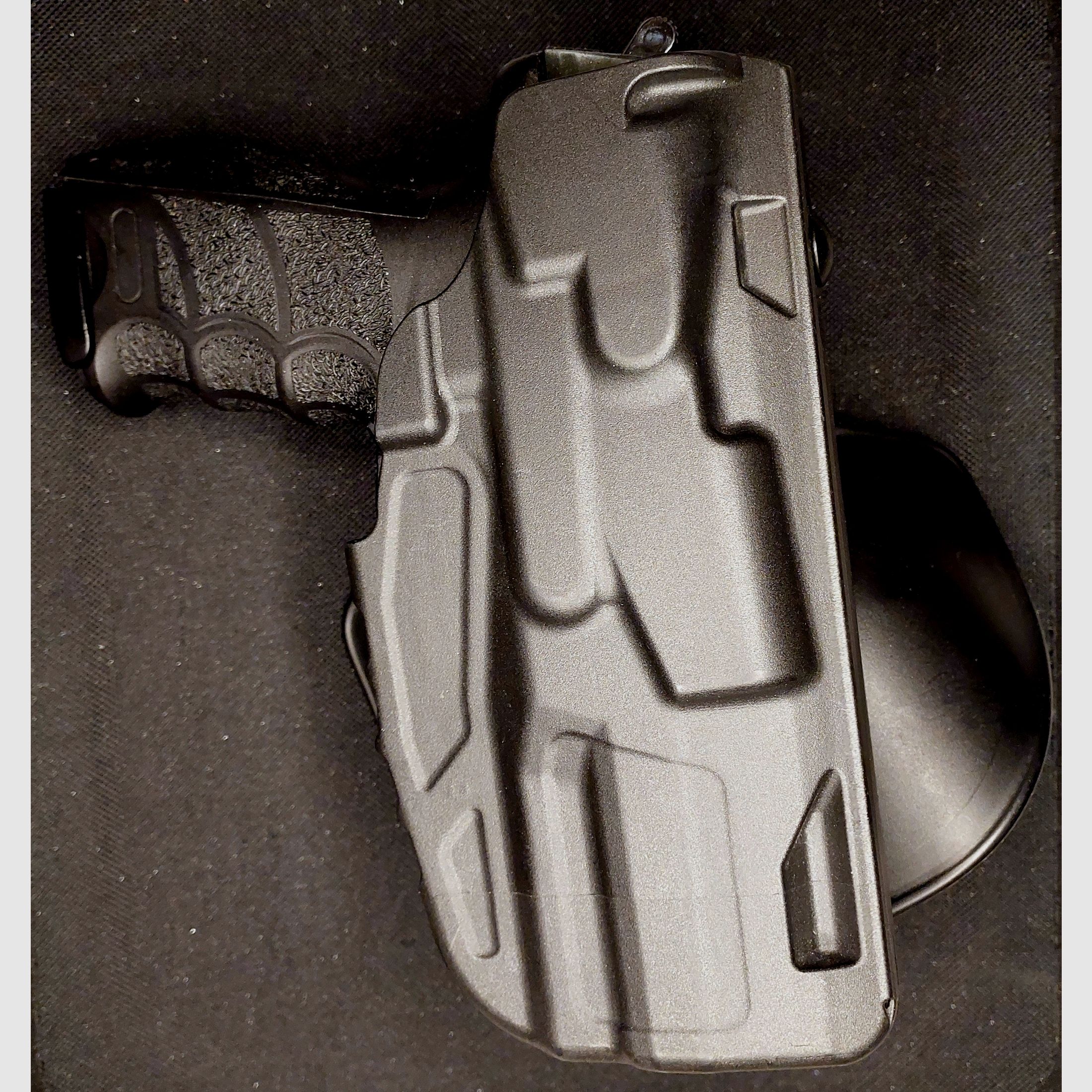 Heckler & Koch P30 9 mm P.A.K. brüniert (PTB 912) HK P 30 mit Safariland 7378 (7TS-ALS) Paddleholster 295 